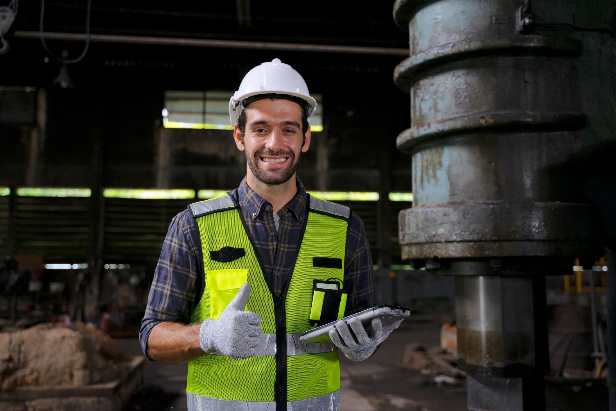 Engineer working in an industrial factory setting